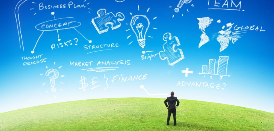 19590194 - business planning concept, businessman looking at plans in the sky